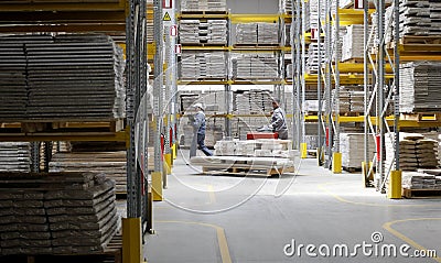 Warehouse workers in wood factory