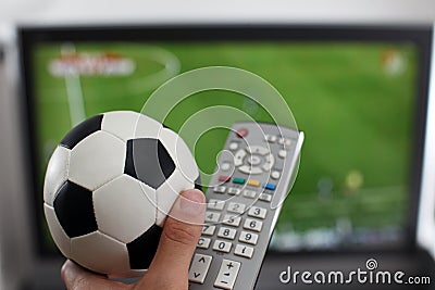 Watching TV with ball and remote