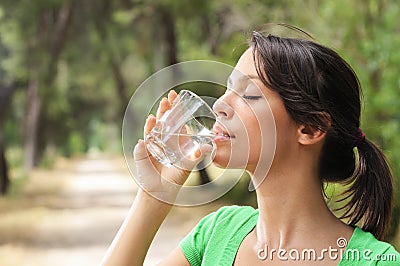 Water drinking in glass
