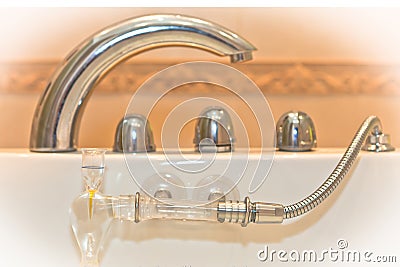 Water faucet with handles and shower