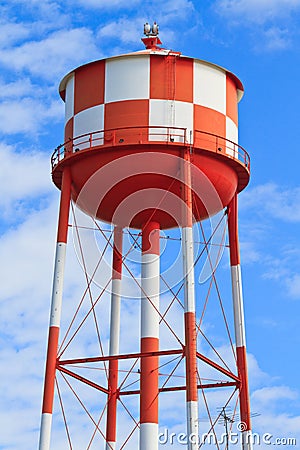 Water tower with red and white stripes