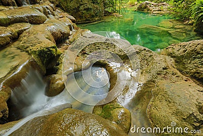 Waterfall beautiful scenery in the tropical forest.