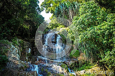 Waterfall with pool in tropical jungle, Na Muang,