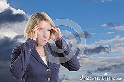 Weather sensitive woman with headache