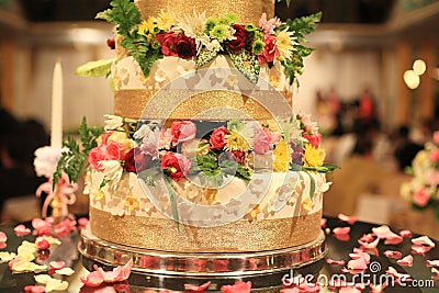 Wedding cake with beautiful decorated flowers