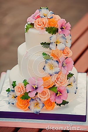 Wedding cake decorated with sugar flowers