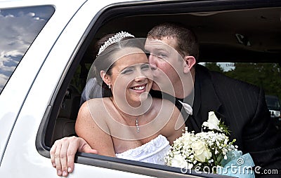 Wedding couple in Limousine