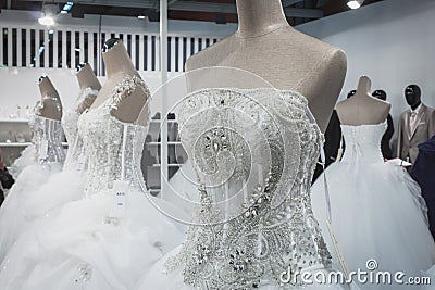 Wedding dresses on display at Si Sposaitalia in Milan, Italy
