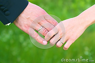 Wedding hands holding each other