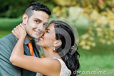 wedding happy couple kissing engagement young spanish park 63604100