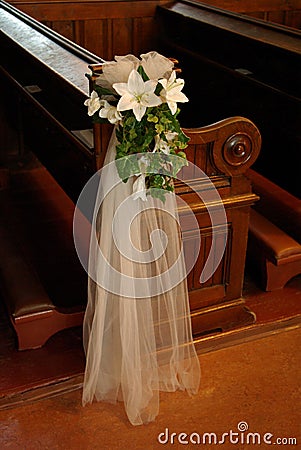 Wedding flowers pew bow