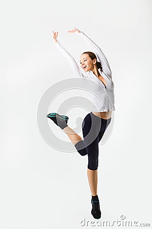 Weight loss fitness woman jumping of joy. Caucasian female model