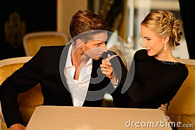 http://thumbs.dreamstime.com/x/well-dressed-couple-luxury-interior-36981830.jpg