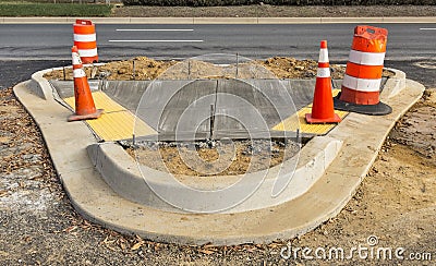 Wet concrete on new sidewalk construction