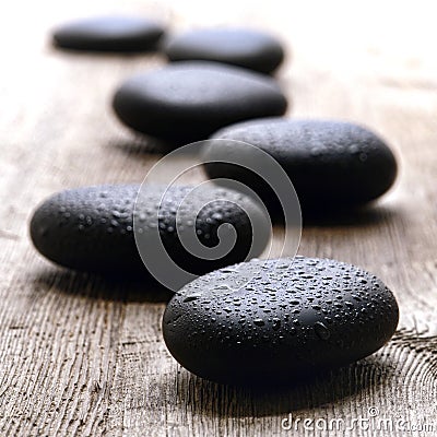 Wet Polished Massage Stones in a Wellness Spa