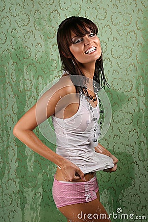 Man In Pool Holding Fully Clothed Woman Laughing Stock Photo