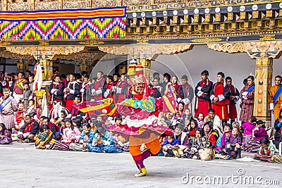 Whirling masked dancer