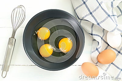 Whisk eggs in gray plate