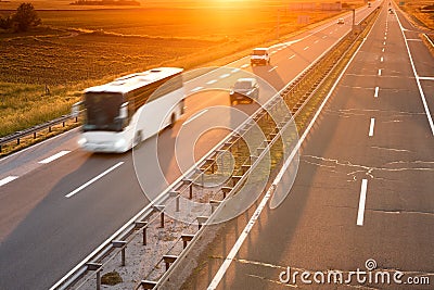 White bus in motion blur on highway