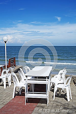 White chair and table on beach