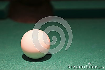 White cue ball on pool table