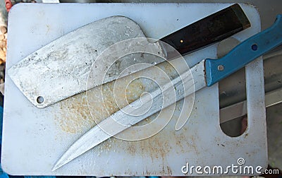 White cutting board and knife