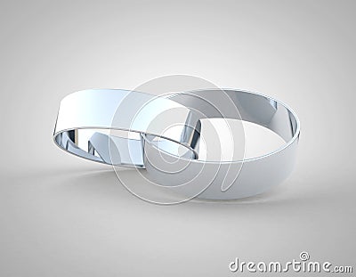 White gold or platinum wedding rings linked together White gold or platinum wedding rings linked together