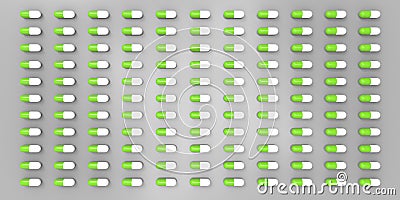 White and green color pills on grey gray background