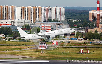 White plane takes off from the runway