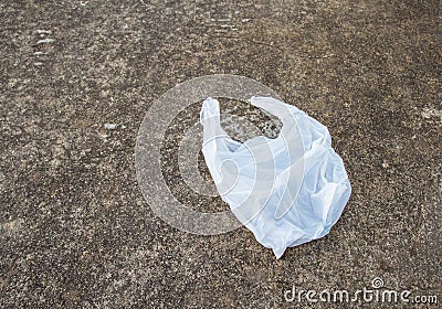 White plastic bags on the concrete floor