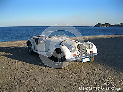 White retro car by the sea. 12.06.13. Sicily