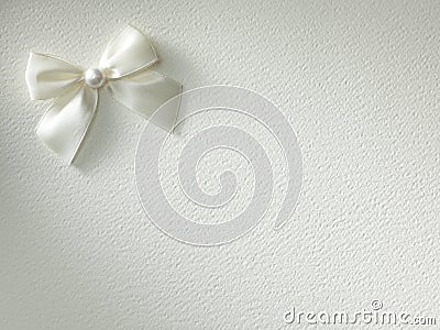 White ribbon with bow on a background