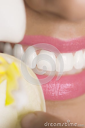 White teeth and orchid