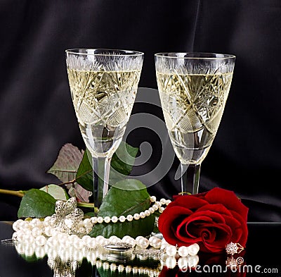 White vine glass with red roses and beads