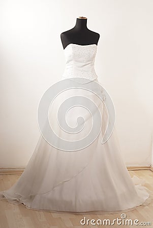 White wedding dress on mannequin