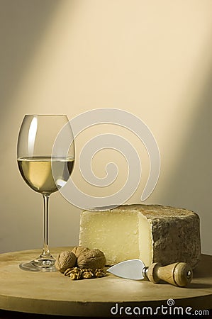 White wine glass and cheese