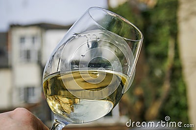 White wine swirling in a glass