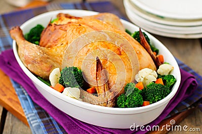 Whole Roast Chicken Stuffed with Bread and Cheese Served with St