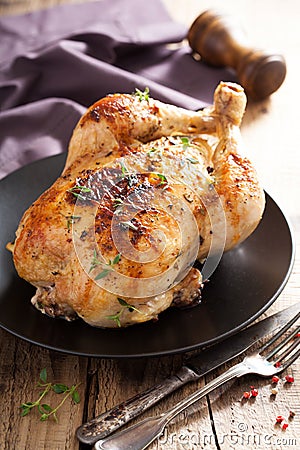 Whole roasted chicken with pepper and thyme