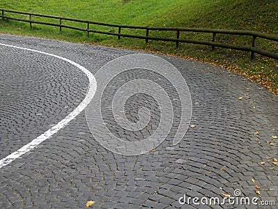 Winding cobbled road