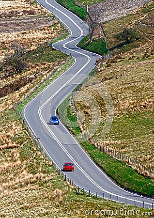 Winding road with cars