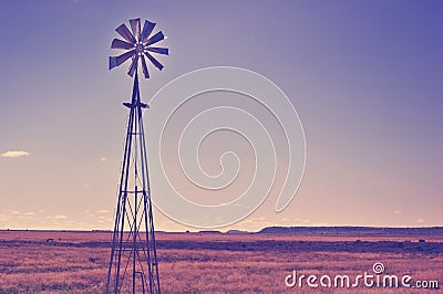 Windmill in the arid landscape