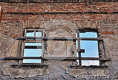 Windows in crumbling wall