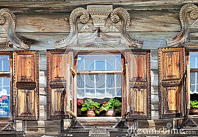 Windows on the facade of the wooden house