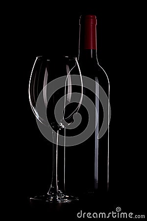 Wine bottle and glass outline on black