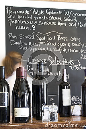 Wine and menu board at restaurant