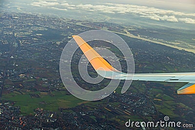 Wing of aircraft with aerial of Hamburg