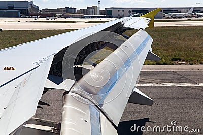 Wing of an airplane with landing flaps