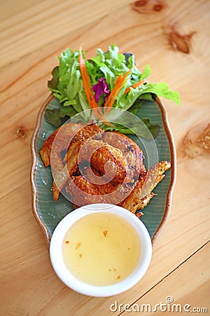 Wings fied chicken on dish in thai menu