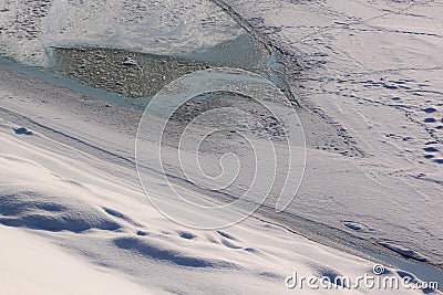 Wintry Landscape with frozen river